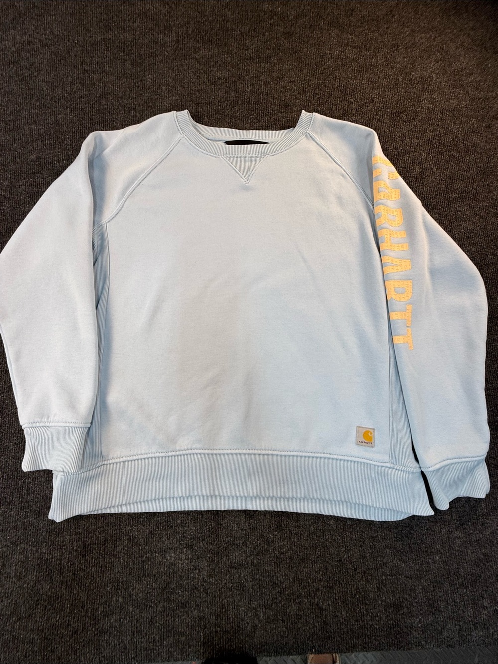 Carhartt Women’s Relaxed Light Blue Crewneck Sweatshirt with Yellow Sleeve Scrip